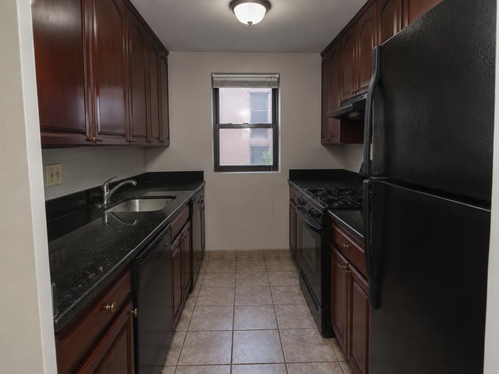 Narrow galley opened into the living space in Henderson, NV — before kitchen remodeling photo